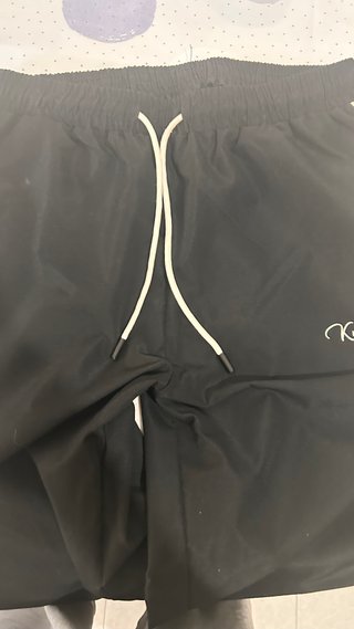 Pantalones anchos chándal con raya lateral