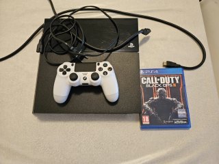 PS4 500GB Negra + Mando Blanco y juego