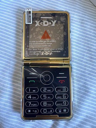 Teléfono Móvil Plegable Xgody S200 Dorado