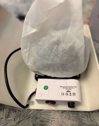 Aspirador de mesa Pollie para uñas