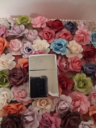 Encendedor Zippo plateado con Diseño