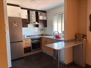 Cocina completa con campana extractora