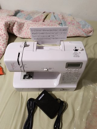 Máquina de coser eléctrica portátil Ut