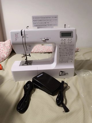Máquina de coser eléctrica portátil Ut