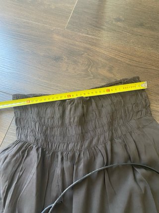 Mono sin mangas gris con cinturón