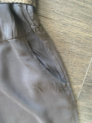Mono sin mangas gris con cinturón