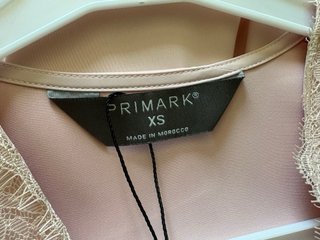 Blusa rosa claro Primark con encaje