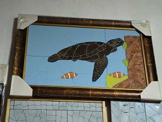 Quadro di piastrelle con tartaruga marina e pesci