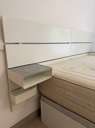 Cama canapé y cabecero
