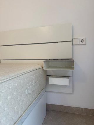 Cama canapé y cabecero
