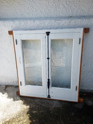 Ventana de madera maciza con 2 hojas