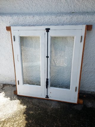 Ventana de madera maciza con 2 hojas