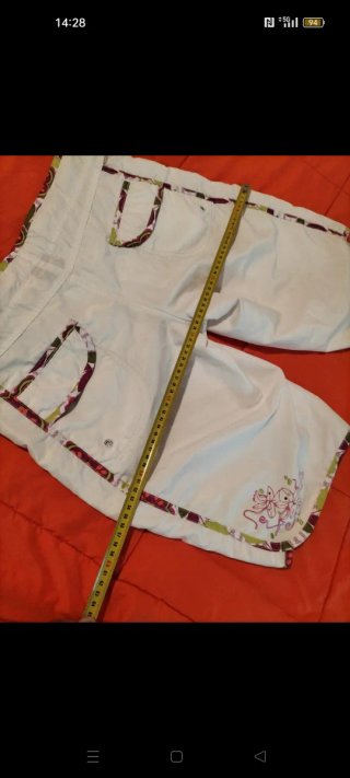 Bañador infantil blanco y multicolor.