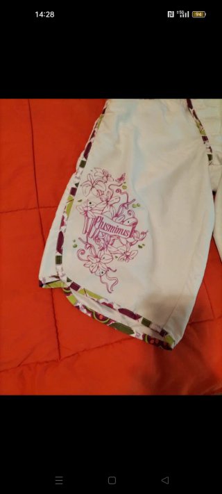 Bañador infantil blanco y multicolor.