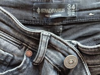 Pantalones vaqueros grises acampanados