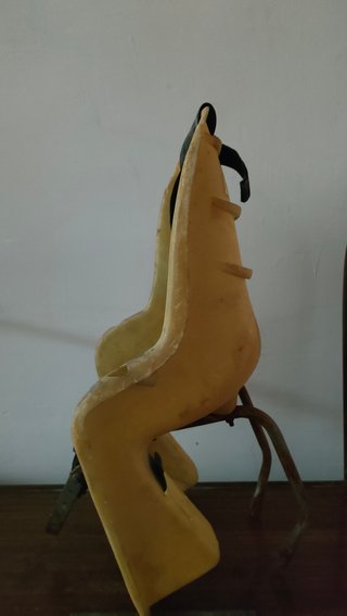 Silla antigua portabebés