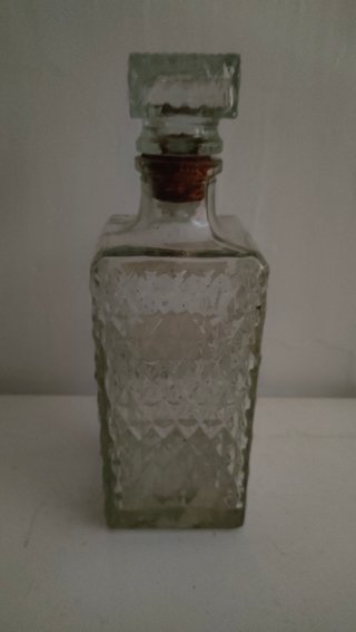 Botella antigua de cristal con tapón
