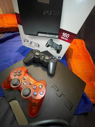 PlayStation 3 Slim Pack Juegos y mandos