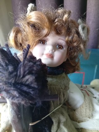 Muñeca de porcelana antigua