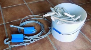 Cobertor de piscina beige y azul de 11,5 x 7 m.