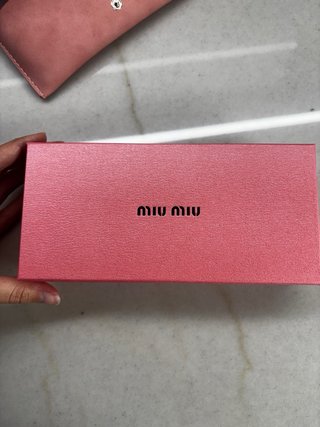 Gafas de sol Miu Miu negras
