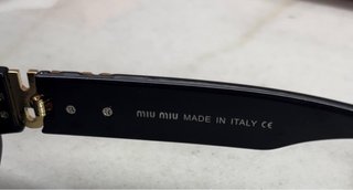 Gafas de sol Miu Miu negras