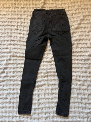 Pantalones pitillo negros