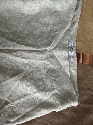 Pantalón corto beige con lazada