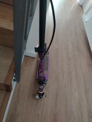 Patinete morado para niña