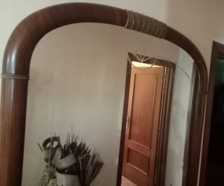 Espejo antiguo de madera y cristal
