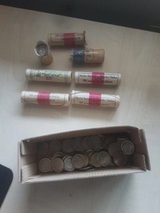 Cartuchos de 50 pesetas nuevas