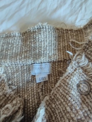 Chaqueta beige con flecos