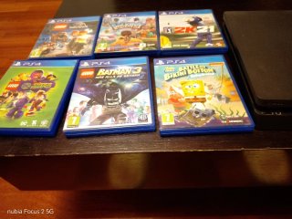 PS4 (PlayStation 4) + Mando + Cargador + 9 Juegos