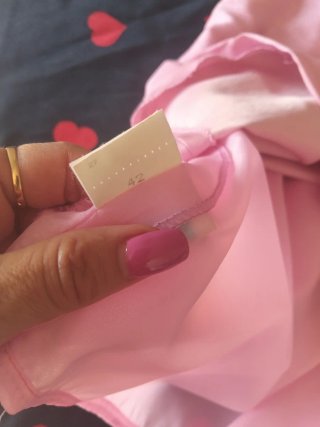 Conjunto falda y corpiño rosa de seda.