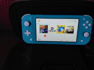Nintendo Switch Lite Verde + 4 Juegos + funda