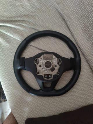 Volante Golf mk8 con levas.