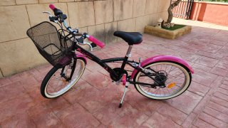 Bicicleta niña rosa y negra