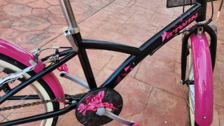 Bicicleta niña rosa y negra