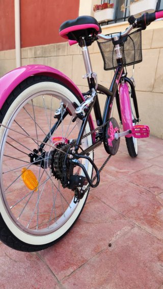 Bicicleta niña rosa y negra