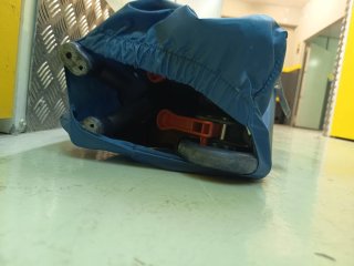 Cuna de viaje azul y naranja