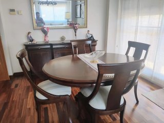 Mesa comedor ovalada extensible madera maciza