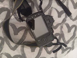 Cámara Nikon con accesorios