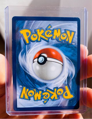 Carta Pokémon Mega Charizard X EX Dorada