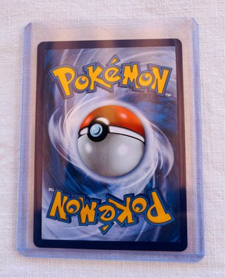 Carta Pokémon Mega Charizard X EX Dorada