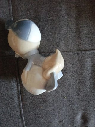 Figura de cerámica de Pato Lucas