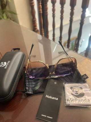 Gafas de sol Hokana doradas con cristales azulados
