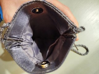 Bolso de fiesta con flecos y pedrería