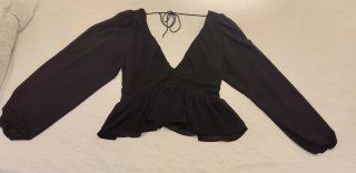 Blusa negra de manga larga