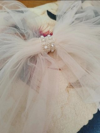 Coprispalle in tulle manoseta