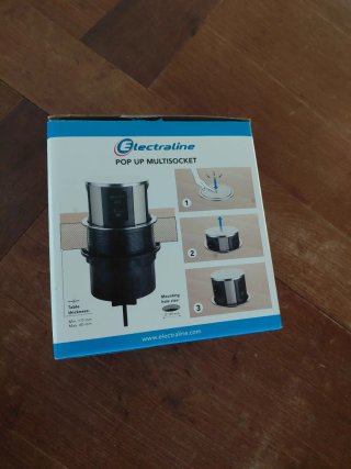 Enchufe escamoteable con USB